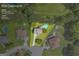 Aerial view of the property's lot lines showing home with in-ground pool, landscaping, and neighboring houses at 684 Doe Lane Ln, Loganville, GA 30052