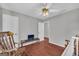 Bedroom showcasing hard surface floors and ample natural light, creating a welcoming space at 684 Doe Lane Ln, Loganville, GA 30052