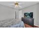 Well-lit bedroom features hard surface floors and neutral walls, offering a calming retreat at 684 Doe Lane Ln, Loganville, GA 30052
