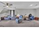 Spacious bonus room with plush carpet, comfortable seating, and versatile layout at 684 Doe Lane Ln, Loganville, GA 30052