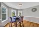 Dining area featuring hardwood floors and natural light, perfect for meals at 684 Doe Lane Ln, Loganville, GA 30052