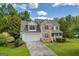 Beautiful two story home features stone accents, attached garage, and an inviting front porch at 684 Doe Lane Ln, Loganville, GA 30052