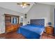 Comfortable main bedroom with wood floors, vaulted ceilings, and ample space at 684 Doe Lane Ln, Loganville, GA 30052