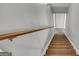 View of the carpeted staircase leading to an upper level at 684 Doe Lane Ln, Loganville, GA 30052