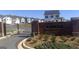 Elegant community entrance with a brick gate and the Shoal Creek neighborhood name prominently displayed at 11899 Aukerman Way, Hampton, GA 30228