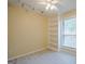 Cozy bedroom featuring built-in bookshelves and modern lighting at 1102 Wynnes Ridge Cir, Marietta, GA 30067