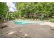 Community pool area with lounge chairs and well-maintained landscaping at 1102 Wynnes Ridge Cir, Marietta, GA 30067