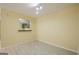 Bright room featuring light-colored floors, a view into the kitchen, and ample space at 1102 Wynnes Ridge Cir, Marietta, GA 30067