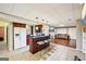 Basement area with kitchen bar, seating, and access to a cozy living area at 1285 Willow Park Way, Cumming, GA 30041