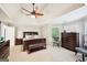 Expansive main bedroom with tray ceiling, sitting area, and natural light at 1285 Willow Park Way, Cumming, GA 30041