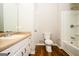 This bathroom is equipped with a shower, toilet, and vanity sink at 6194 Golden Meadow Court Ct, Riverdale, GA 30296