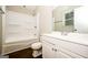 Bathroom featuring tub/shower combo, vinyl flooring and vanity with storage at 6194 Golden Meadow Court Ct, Riverdale, GA 30296