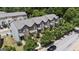 Aerial shot of townhomes, landscaping, street, and multiple units in a well-maintained neighborhood at 1004 Bayrose Cir, East Point, GA 30344