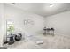 Versatile finished basement space suitable for a home office or gym, ready for personalization at 1004 Bayrose Cir, East Point, GA 30344