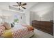 Bright and airy bedroom with tray ceiling, large bed, and cozy decor at 1004 Bayrose Cir, East Point, GA 30344
