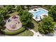 Overhead view of community playground and pool with pergola offering residents recreational opportunities at 1004 Bayrose Cir, East Point, GA 30344