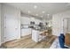 Modern kitchen featuring white cabinets, stainless steel appliances, and a center island at 1004 Bayrose Cir, East Point, GA 30344