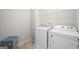 Functional laundry room with a washer and dryer at 1004 Bayrose Cir, East Point, GA 30344
