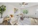 Inviting living room with a large sectional sofa, wood floors, and a cozy ambiance at 1004 Bayrose Cir, East Point, GA 30344