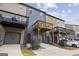 Townhome rear exterior showcasing private back decks, garage, and modern architectural appeal at 1004 Bayrose Cir, East Point, GA 30344