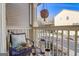 Relaxing balcony featuring a comfortable chair, decorative pillows, and a view of the neighborhood at 1753 Liberty Pkwy, Atlanta, GA 30318