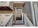 Charming front entrance with a black door, white railings, and a welcoming sign at 1753 Liberty Pkwy, Atlanta, GA 30318
