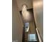 Elegant hallway featuring a modern chandelier and a large mirror, creating a bright and open space at 1753 Liberty Pkwy, Atlanta, GA 30318