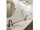 Modern bathroom featuring dual sinks, a white countertop, and subway tile backsplash at 2855 Briarlake Ne Rd, Atlanta, GA 30345