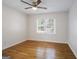 Bright bedroom with hardwood floors, natural light, and a minimalist style at 2855 Briarlake Ne Rd, Atlanta, GA 30345
