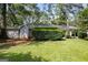 Well-maintained home featuring a lush green lawn and mature trees, offering great curb appeal at 2855 Briarlake Ne Rd, Atlanta, GA 30345