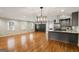 Bright living room with hardwood floors, stylish lighting, and an open floor plan at 2855 Briarlake Ne Rd, Atlanta, GA 30345