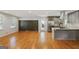Spacious living room with hardwood floors, an open layout and access to a modern kitchen at 2855 Briarlake Ne Rd, Atlanta, GA 30345