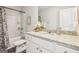 Bathroom features a vanity with granite countertop, a tub with shower, and modern fixtures at 179 Stanchion Dr, Union City, GA 30291