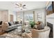 Bright and airy living room showcasing stylish decor, comfortable seating, and a modern fireplace at 179 Stanchion Dr, Union City, GA 30291
