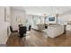 Open concept floor plan with dining area, living space, kitchen island and ample natural light at 179 Stanchion Dr, Union City, GA 30291