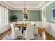 Inviting dining room with stylish decor, including a round table and elegant white chairs at 125 Franklin Pl, Atlanta, GA 30342