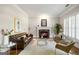 Bright living room with a fireplace, comfortable seating, and a sophisticated, inviting ambiance at 125 Franklin Pl, Atlanta, GA 30342