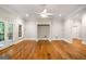 Open floor plan with hardwood floors, recessed lighting and access to an outdoor balcony at 125 Franklin Pl, Atlanta, GA 30342