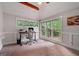 Bright bedroom with vaulted ceilings, wainscotting and large windows that overlook wooded area at 145 Mount Shasta Ln, Johns Creek, GA 30022