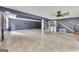 Spacious basement featuring tile flooring, stairs, a ceiling fan, and a laundry area with washer and dryer at 178 Castleair Ne Dr, Kennesaw, GA 30144