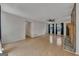 Spacious living room featuring hardwood floors, a stone fireplace, and access to other rooms at 178 Castleair Ne Dr, Kennesaw, GA 30144