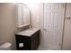 Bathroom featuring a granite vanity, neutral paint, and tile floors at 37 La Rue Nw Pl, Atlanta, GA 30327