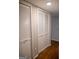 Closets featuring paneled doors and hardwood floors at 37 La Rue Nw Pl, Atlanta, GA 30327