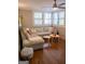 Inviting living room with a large sectional sofa and natural light, perfect for relaxing and entertaining guests at 37 La Rue Nw Pl, Atlanta, GA 30327