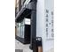 Stylish Market and Bistro exterior with striped awning and modern signage at 100 Carlyle Ln, Fayetteville, GA 30214