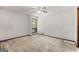 Spacious bedroom with a ceiling fan and a window letting in natural light at 70 Juliana Dr, Ellenwood, GA 30294