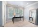 Bright bedroom with a large window, neutral color palette and a full length mirror at 3045 Moss Stone Lane Sw Ln, Marietta, GA 30064