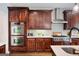Gourmet kitchen featuring custom wood cabinets, stainless steel appliances, and quartz countertops at 3045 Moss Stone Lane Sw Ln, Marietta, GA 30064