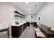 Modern kitchen featuring stainless steel appliances, wood cabinets, and an island with barstool seating at 3045 Moss Stone Lane Sw Ln, Marietta, GA 30064