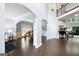 Open living room with archways, gleaming wood floors, and bright, airy feel at 3045 Moss Stone Lane Sw Ln, Marietta, GA 30064
